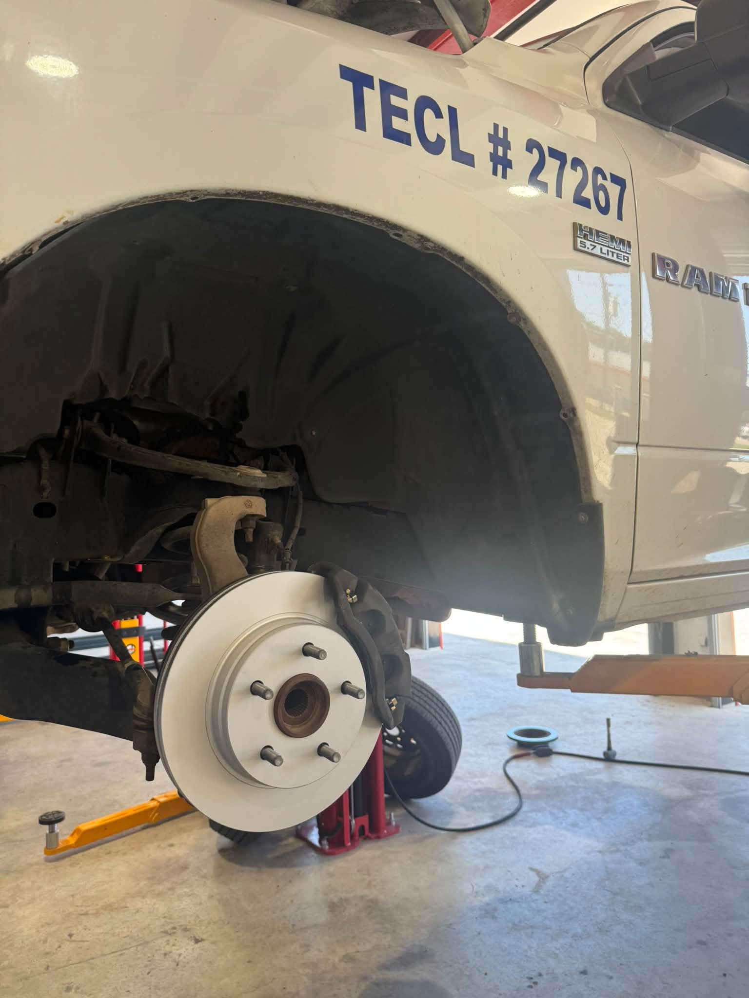Front brake rotor and caliper on a Ram truck
